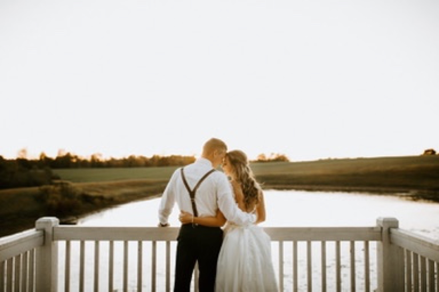 Couple at sunset overlooking the property