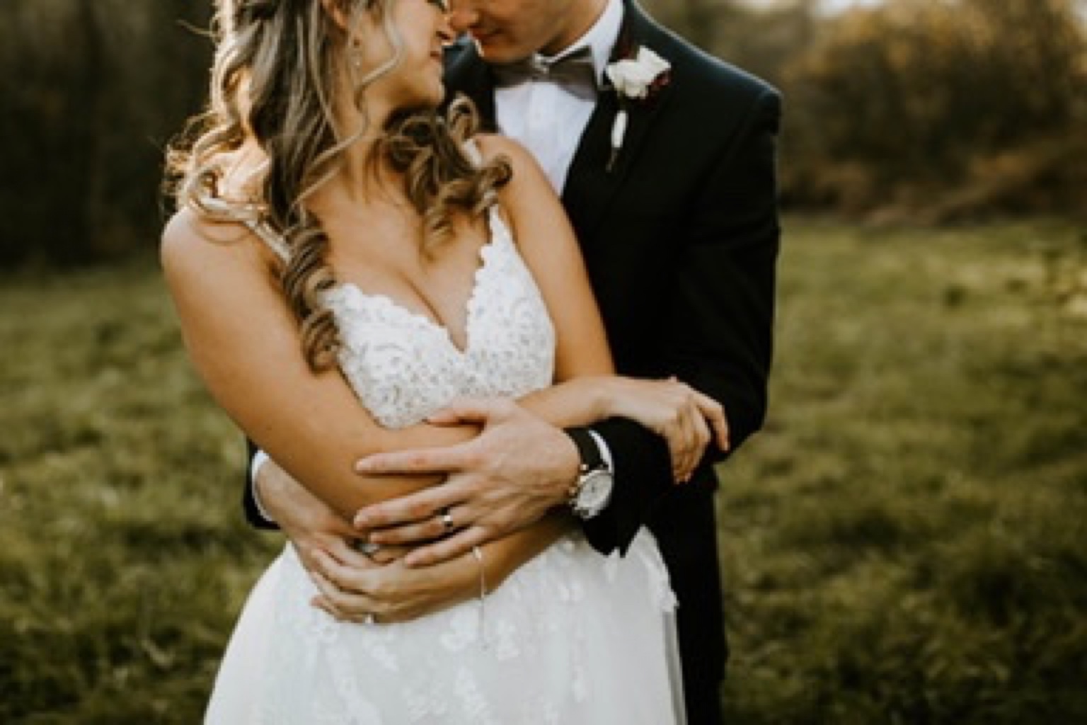 Bride and groom in the field